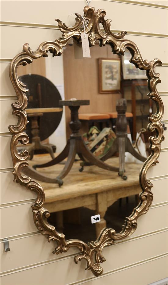 A Louis XV style brass frame mirror W.55cm